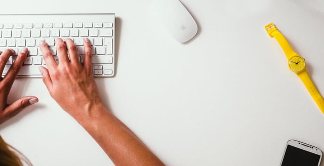 individual in workplace works at desk individual in workplace works at desk